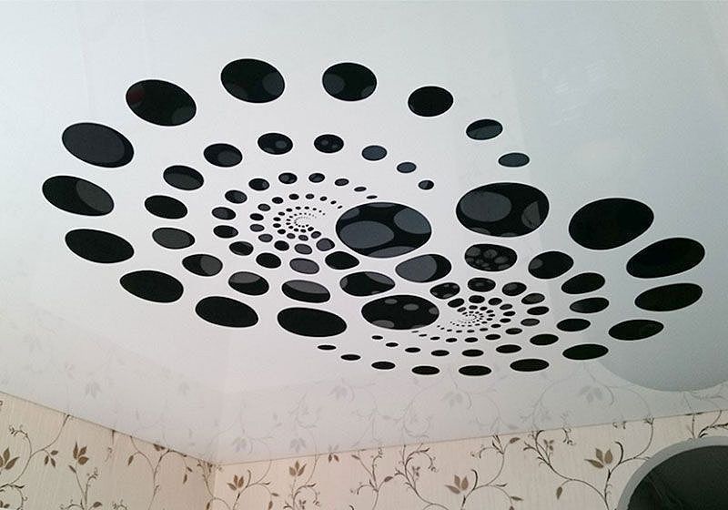 Apply stretch ceilings with geometric shapes (circles)